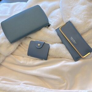 New set of 3 beautiful blue wallets and card holder.